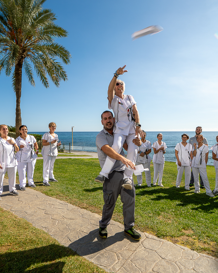 Hotel team celebration after a training session by the sea