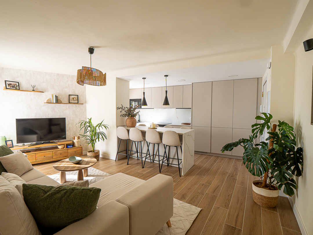 Open-plan living and kitchen with warm minimalist styling