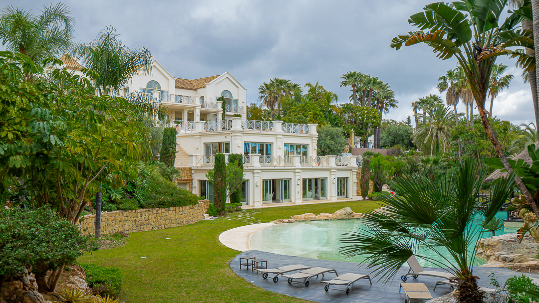 Mediterranean luxury villa with lagoon pool and tropical gardens