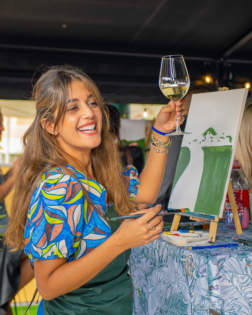 Creative wine and paint workshop in an outdoor setting
